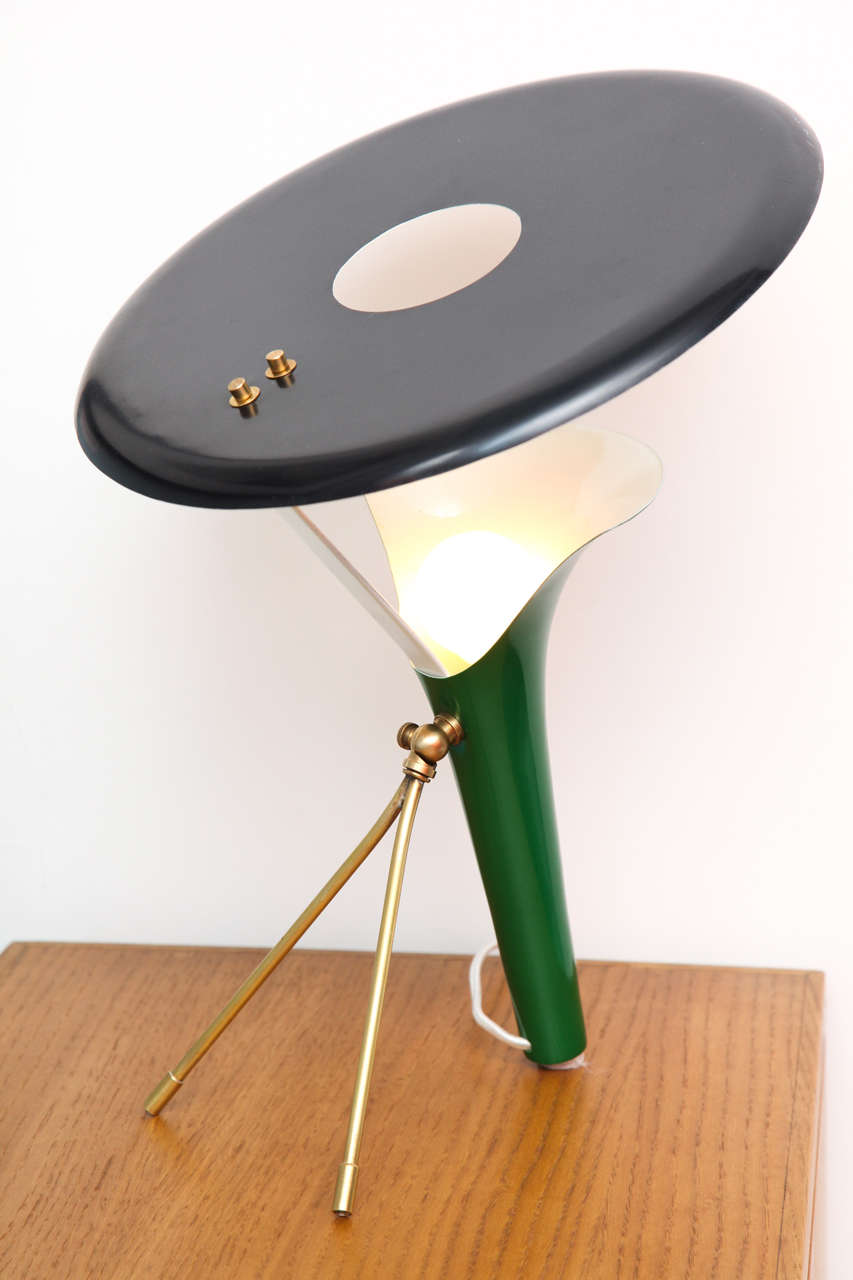 Sculptural, one-of-a-kind table lamp of enameled metal and brass. Fantastic architectural form, with a single candelabra socket.