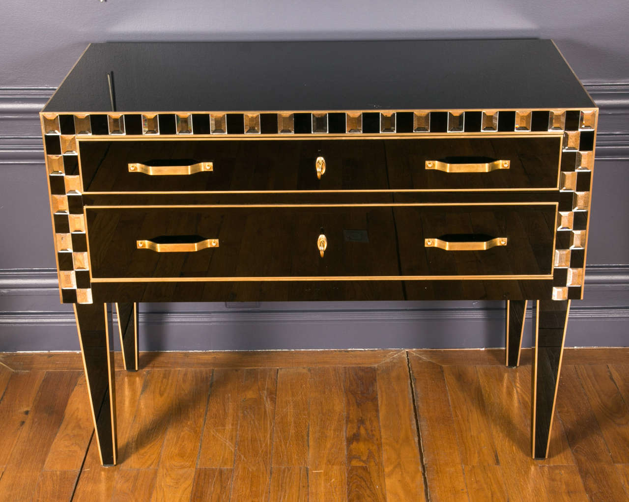commodes in brass and black mirror, two drawers