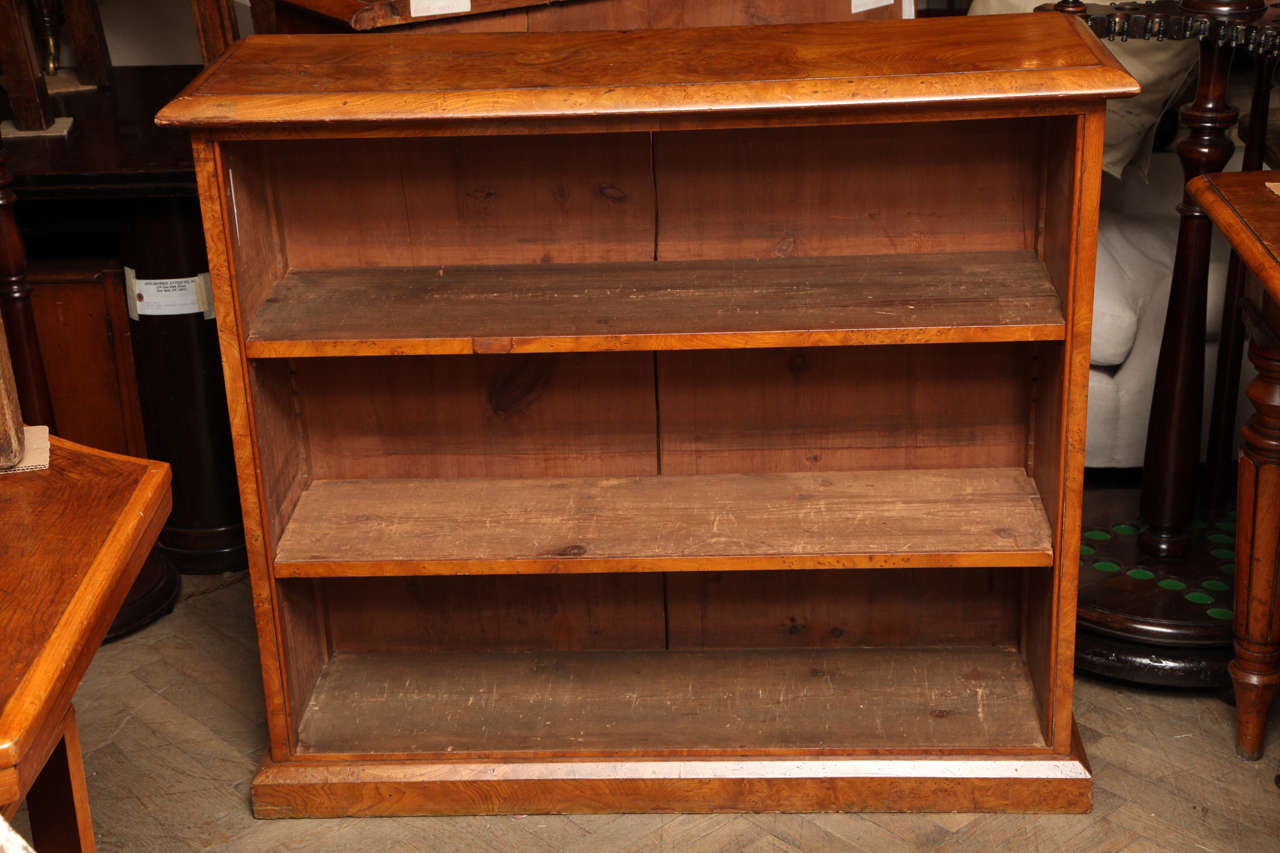 UK circa 1820 this pair of burled maple low bookcases are of terrific proportions. These bookcases have adjustable shelving via the side brackets. They are unique because of their sizing.