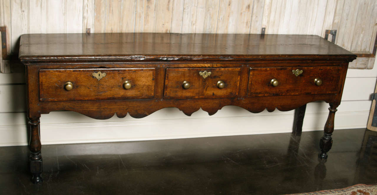 Original hardware.  This piece would also make a great console or buffet.