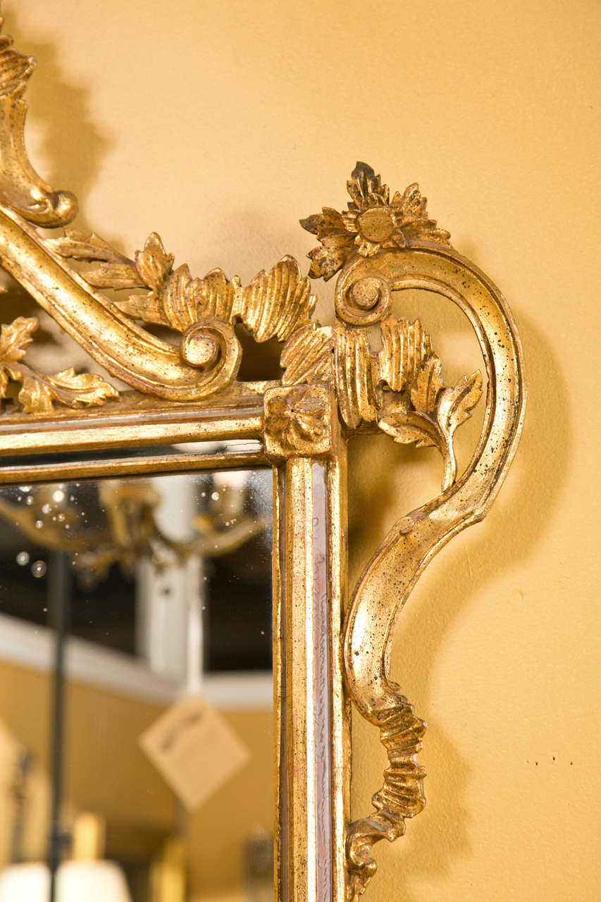 Decorative Giltwood Mirror Rectangular Frame Decorated With Foliage And Scrolls In Good Condition In Stamford, CT