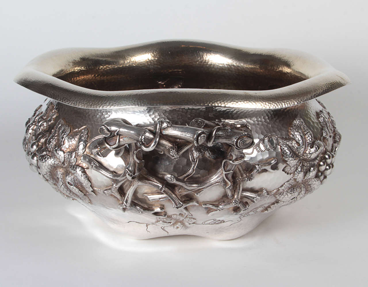 DOMINICK & HAFF (active 1872-1928) USA
W. H. GLENNY & SONS CO. (retailer, New York City)

Impressive Grape and Vine centerpiece bowl   1883

An exceptional and impressive sterling hand wrought 