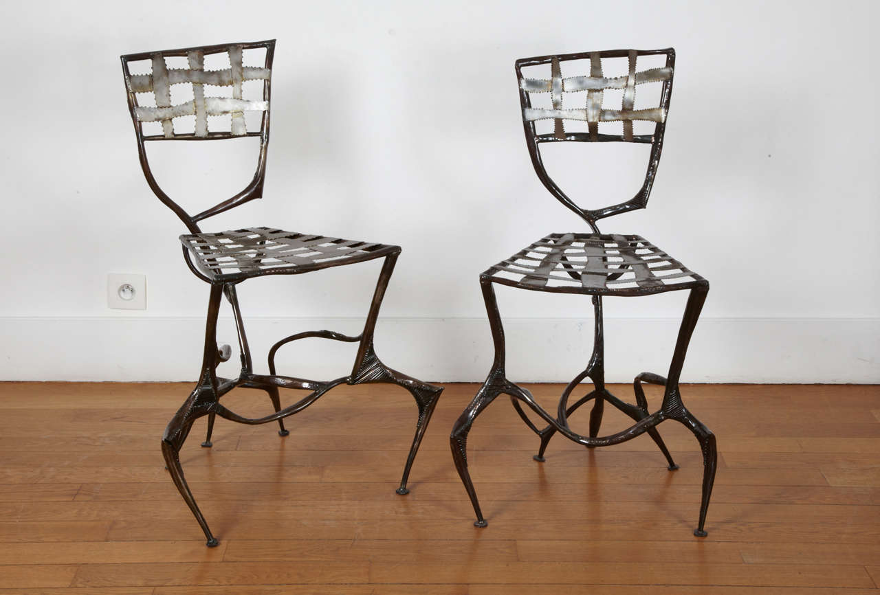 Two sculpted steel copperware chairs, 2008 / 2013 by Manuel SIMON (1978 -). 
Unique different pieces. Signed, dated. 
Can be sold by one.

Manuel SIMON, studied at the Beaux Arts school in Marseille (South France), then worked near the sculptor