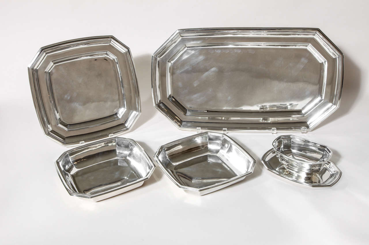 Five-piece sterling silver serving set:
Large octagonal sterling silver tray
Measures: Height 1