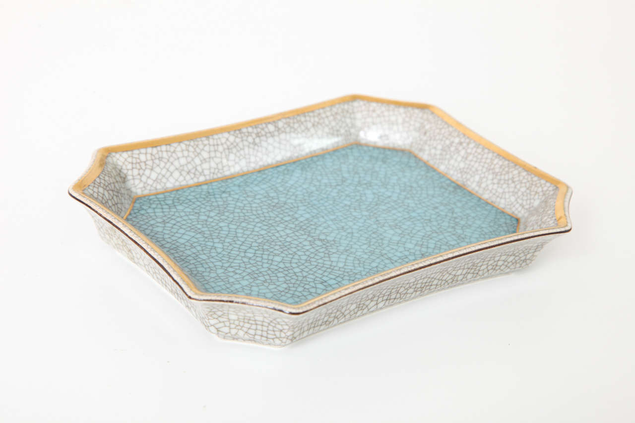Elegant porcelain pin tray in robin's egg blue and white with gilded double border detail. Signed Royal Copenhagen, Denmark to reverse.