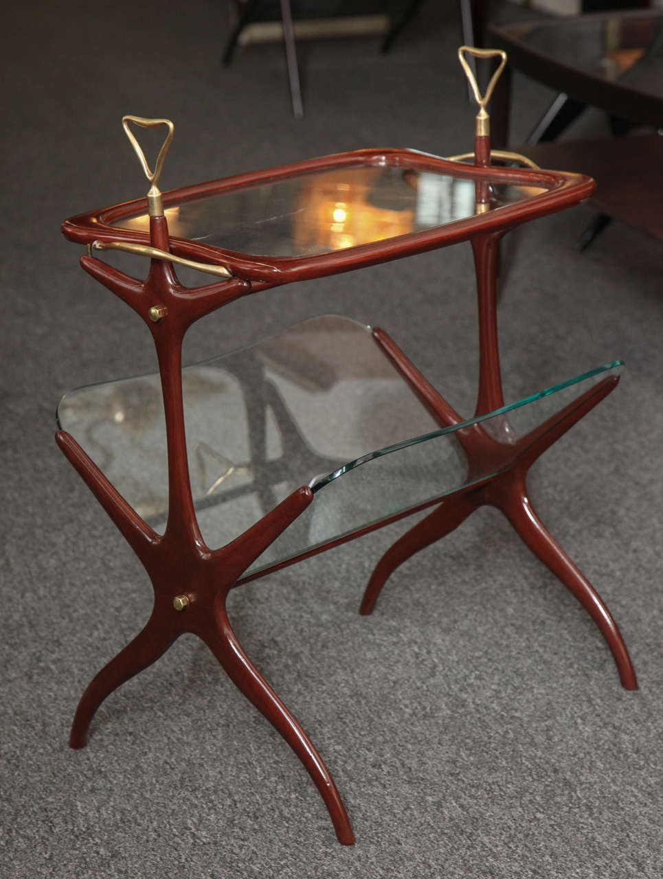 Stunning small magazine table made in Milan, 1955 designed by Cesare Lacca, tray is removable, unusual model and great quality.
 
