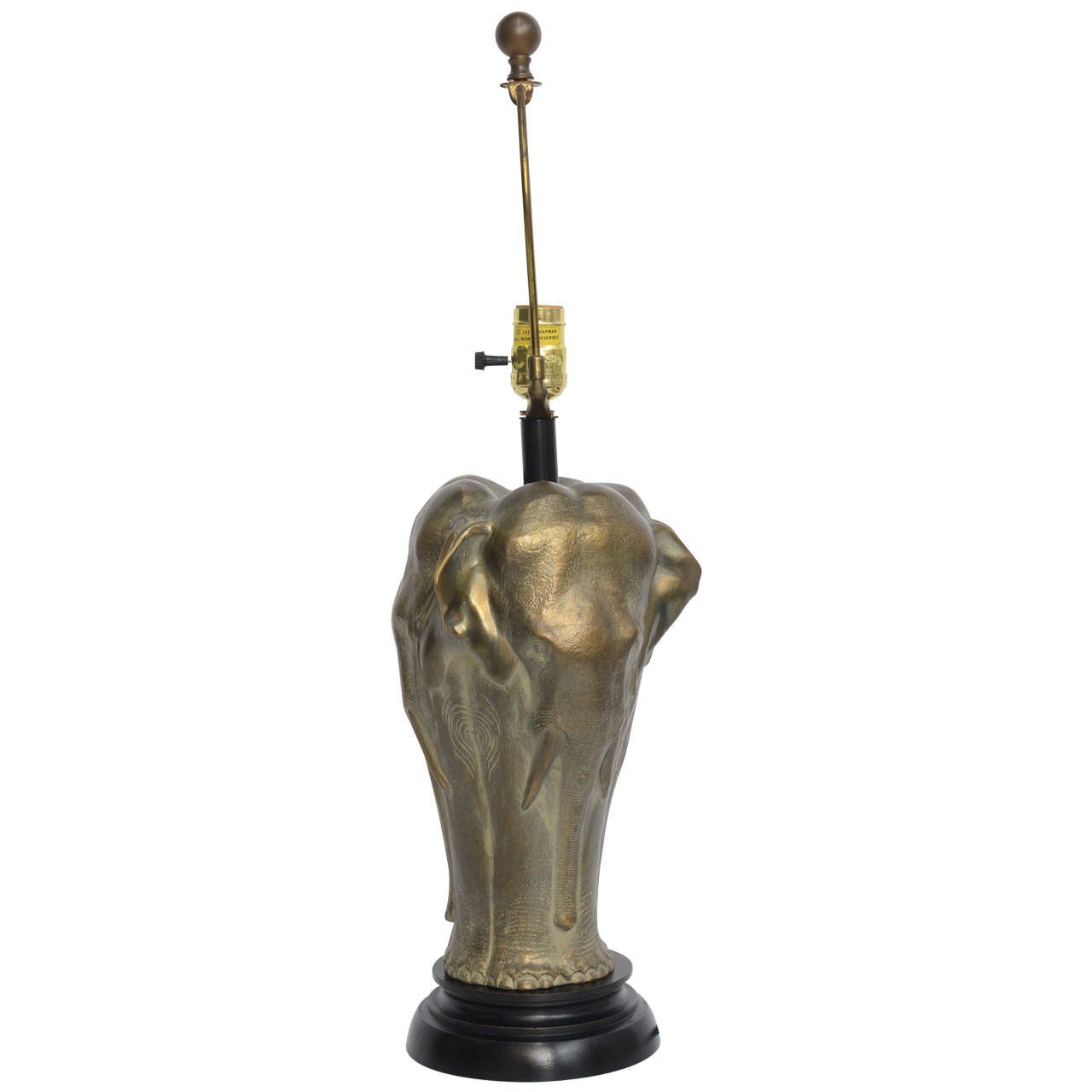 ...SOLD...Wonderful table lamp depicting three elephant's shoulder to shoulder equidistant around the lamp in sculptural bronze. Ebonized wood socle base. Retains original harp and finial. Rewired and with new UL three level socket interior,