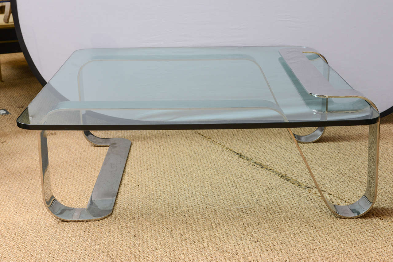 Designed by Gary Gutterman in 1973, this coffee table is a remarkable sculpture and functional piece of furniture made in polished stainless steel.
Gary Gutterman (1942-1993) started his design career as a staff designer with Helikon Furniture