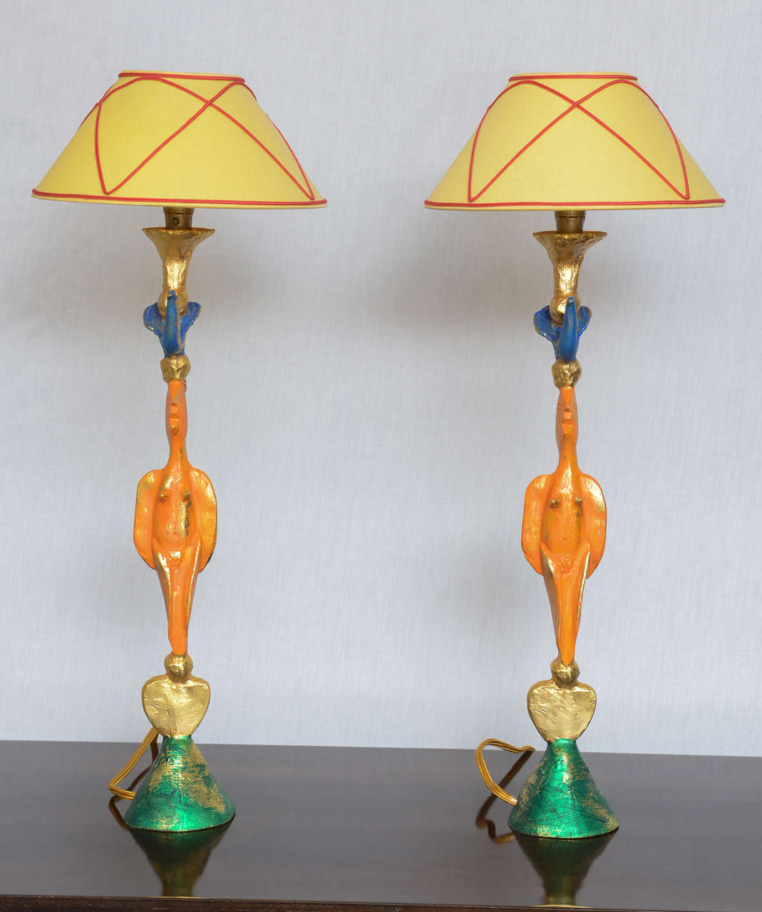 Original paint over gilded bronze bases, these heavy lamps are designed by Pierre Casenove for Fondica.  Original shades included.