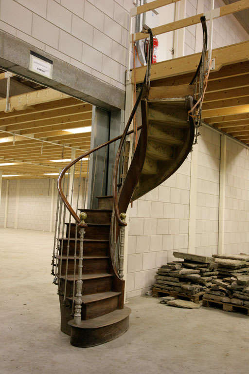 An antique walnut spiral staircase 1