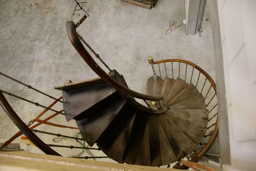 Walnut An antique walnut spiral staircase