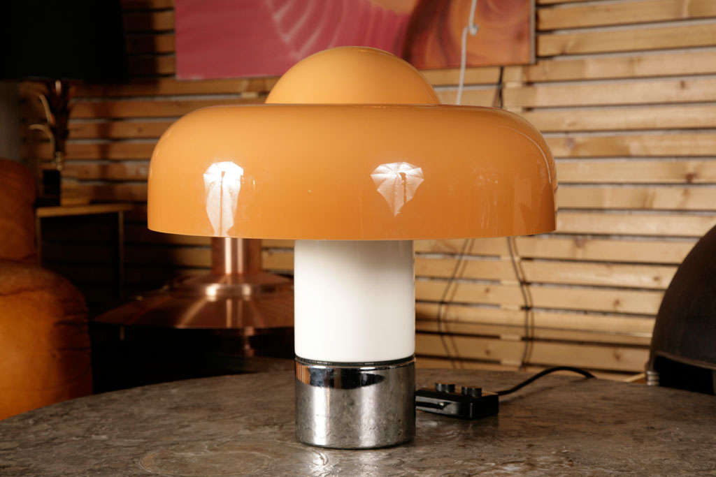 wonderful salmon-colored version of the Brumbury (see other listing for the white version) The base, top and shade can be switched on seperately, with 4 lightsources inside. Wonderful rare design icon.