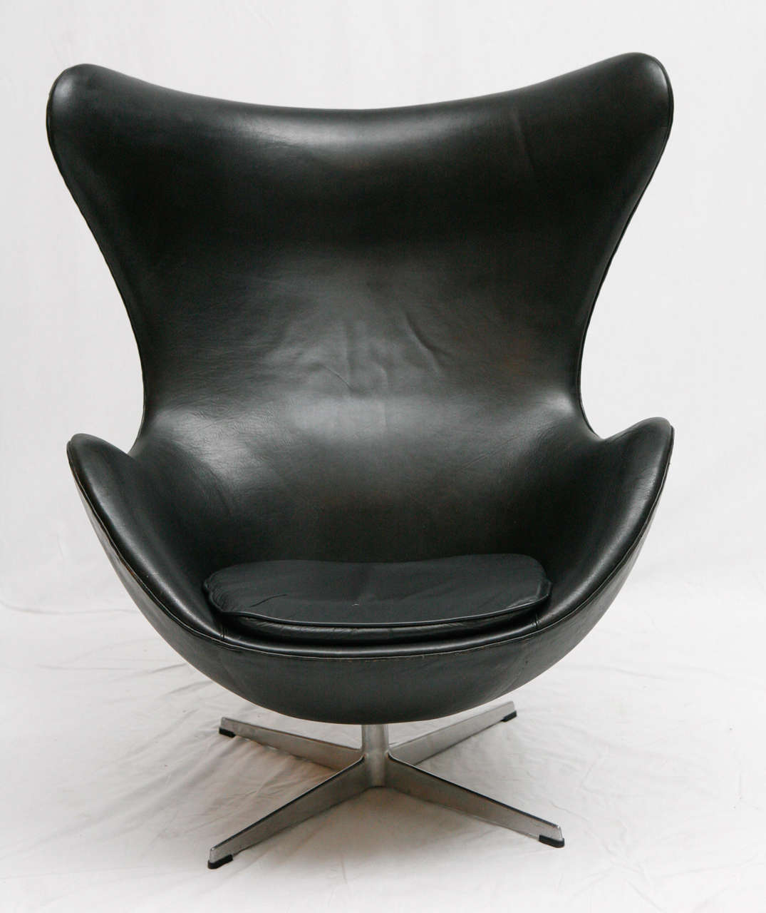 Vintage Black Leather Arne Jacobsen Egg Chair.  Original Leather in Very Good Condition.  Seat Cushion Was Replaced 
A long Time Ago. I Got It From The Original Family That Purchased It In The 60's