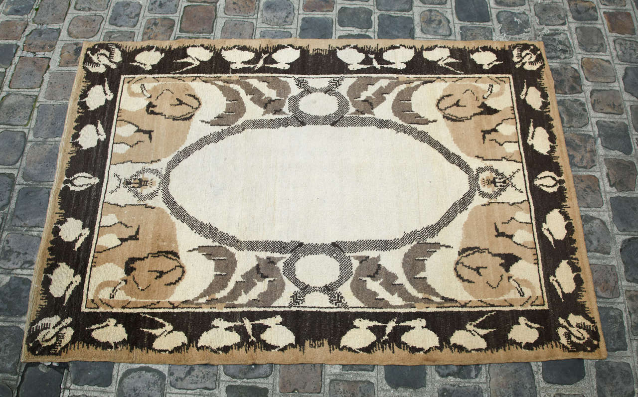 An "exotic" carpet featuring animals and palm trees