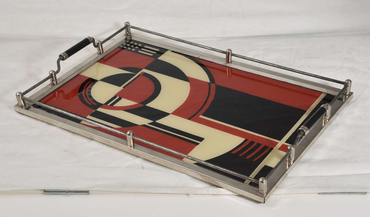 Chromed frame, rails and black handles all in amazing original condition.  Very clean for this tray.
Reverse-painted design in excellent condition, with one small area of lifting and minor paint loss. Best visible in image 5, upper left