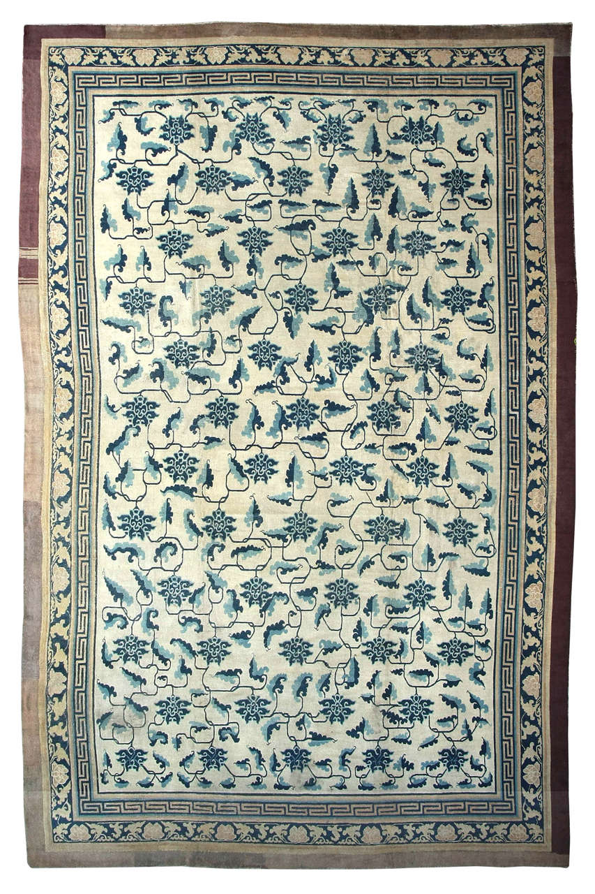 Ming Early Chinese Carpet with Stylized Lotus Flowers and Leaf Stems For Sale