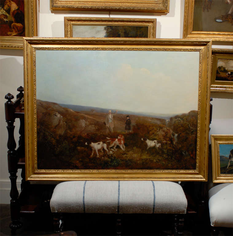 Large English Hunt scene oil painting with dogs in gilt frame.