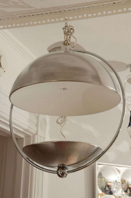 Brushed chrome canopy uplight chandelier. Three candelabra style bulbs.