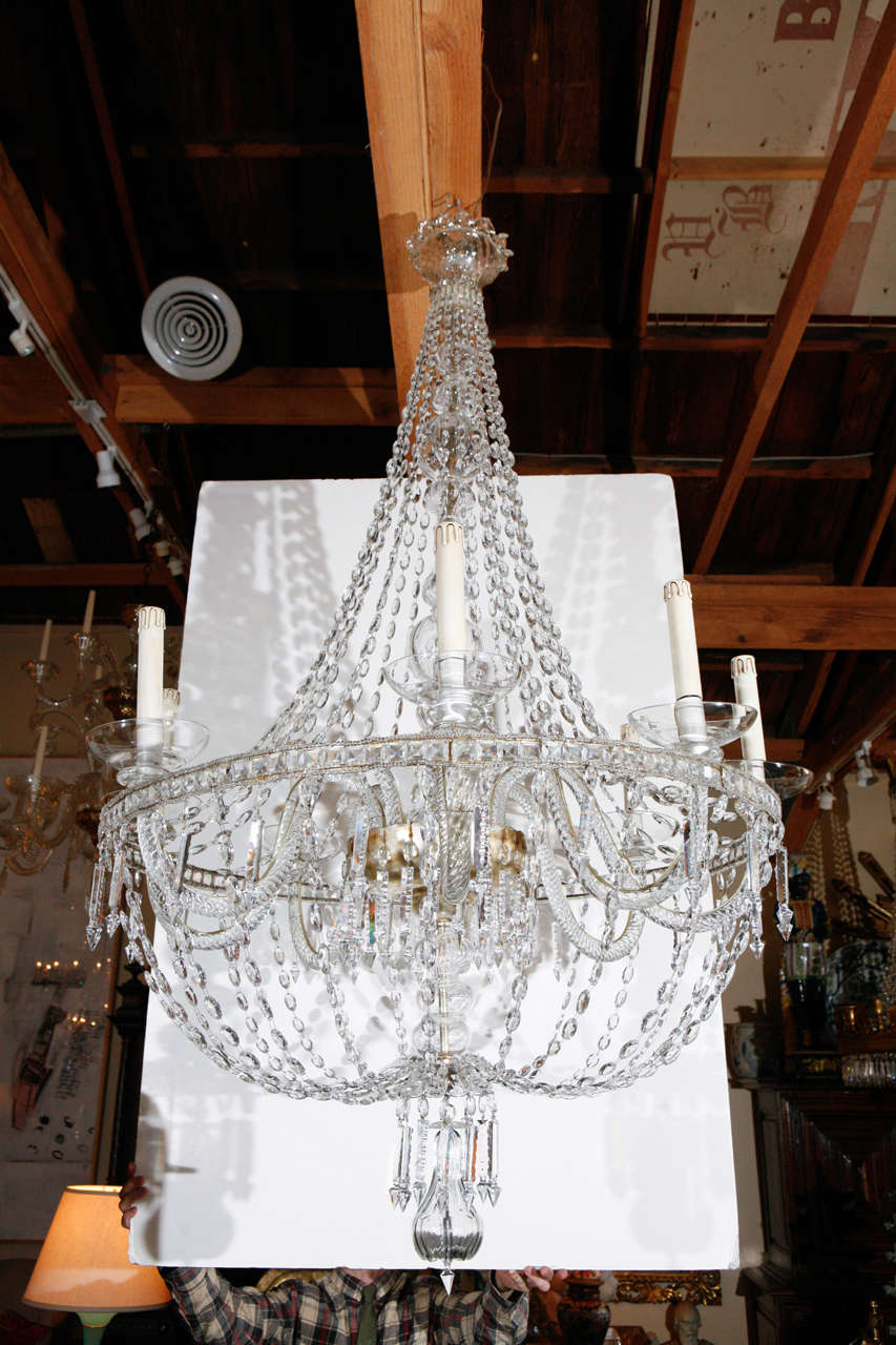 Dramatic, nine-light, Murano glass chandelier with a center band of crystals. Wired for U.S. current.