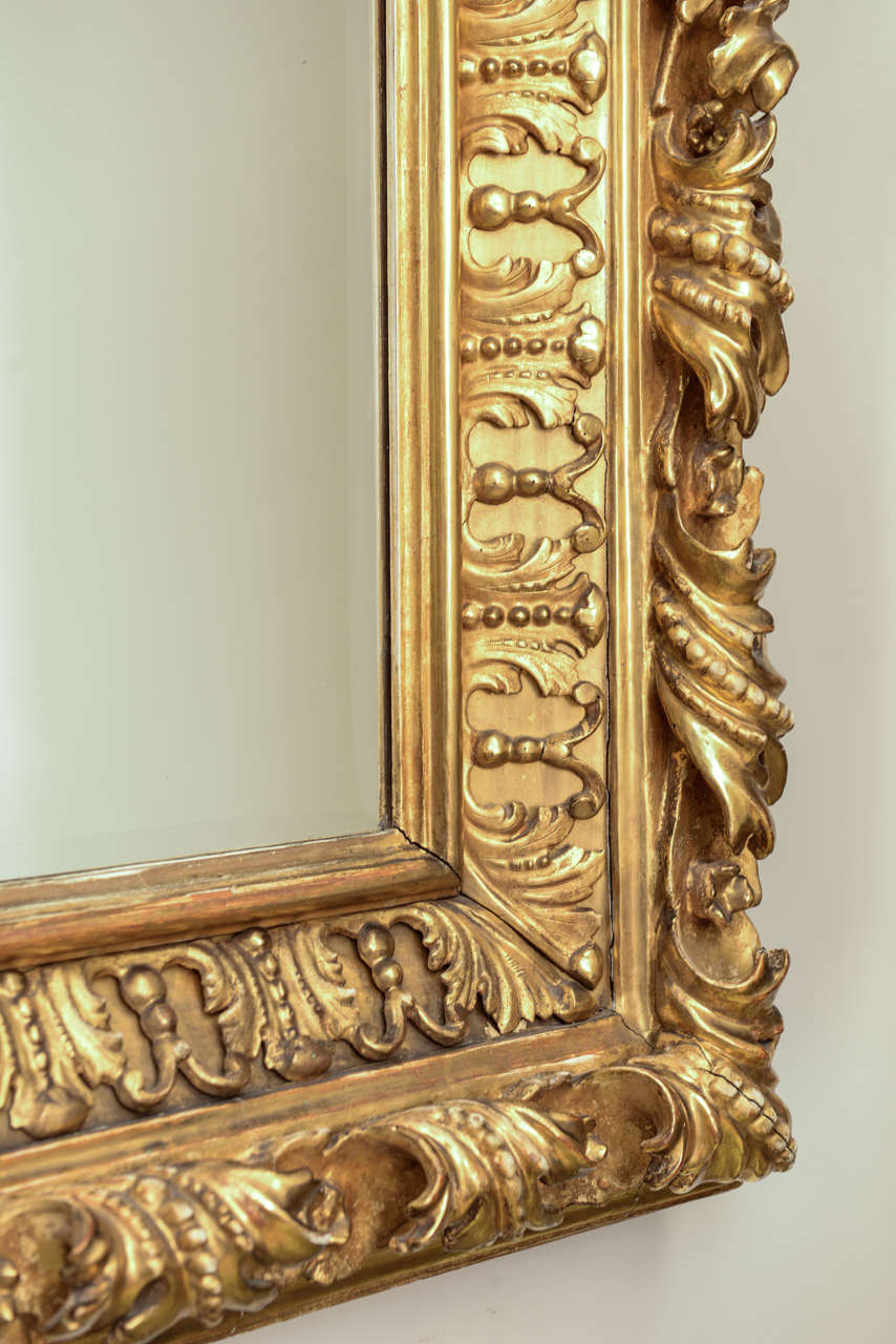 Italian Elaborate Foliate Giltwood 19c. Baroque Mirror For Sale