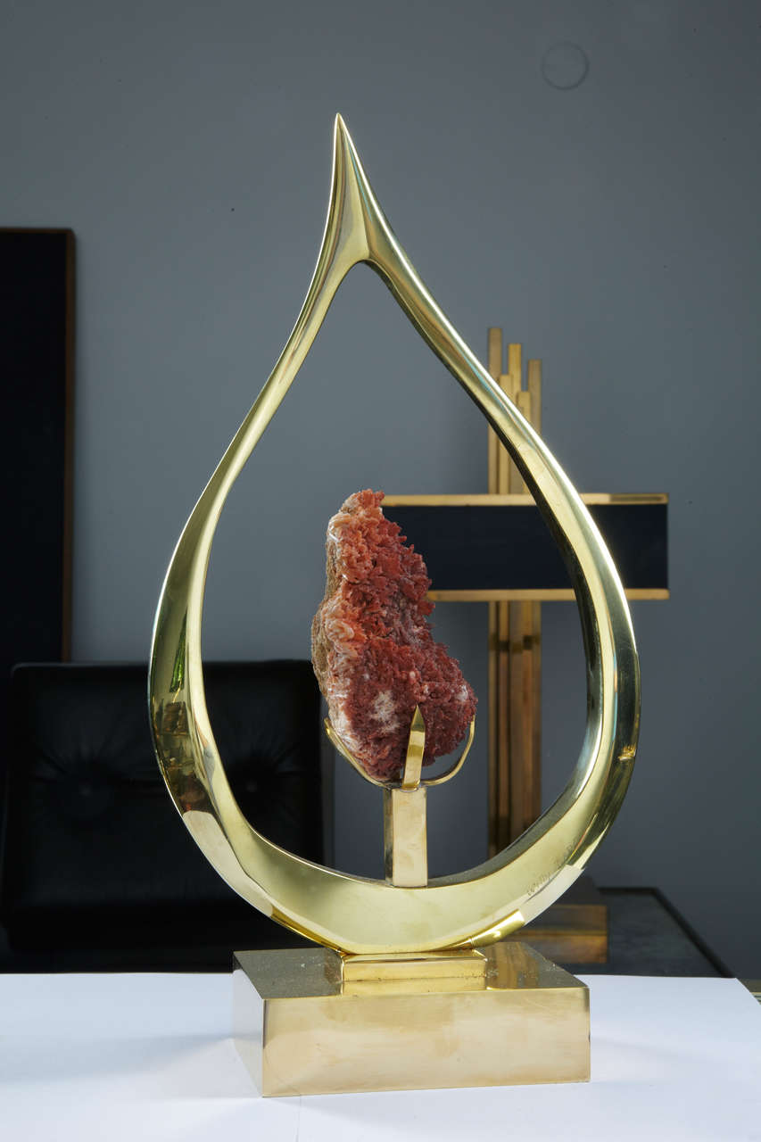 Sculpture in bronze with a red stone, signed Willy Daro