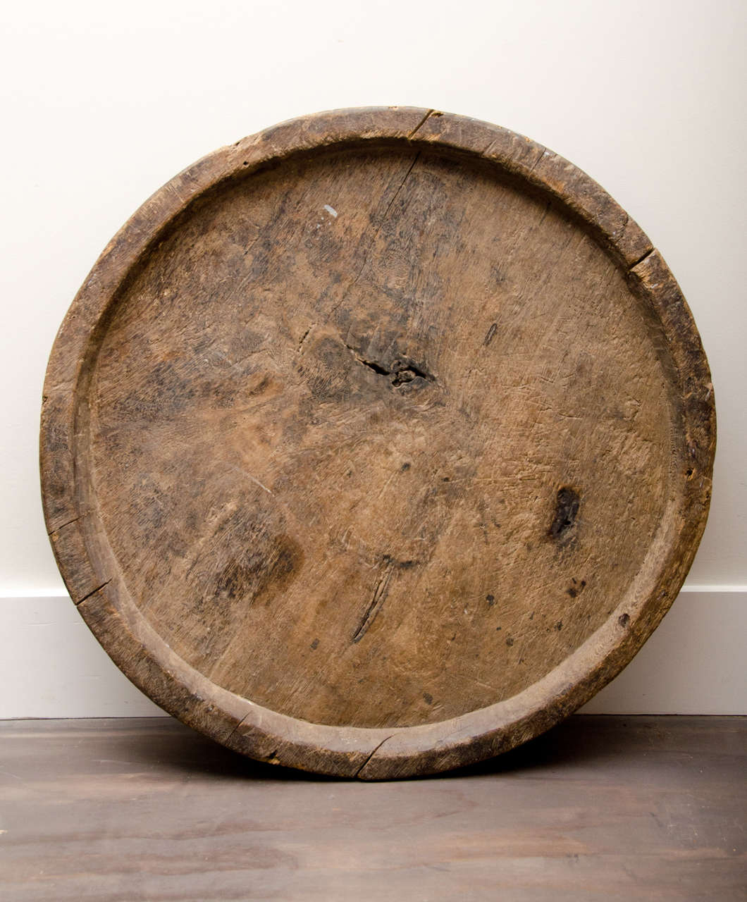 Very large hand-carved wooden platter with beautiful patina, could be great as a wall hanging or on display on a table.