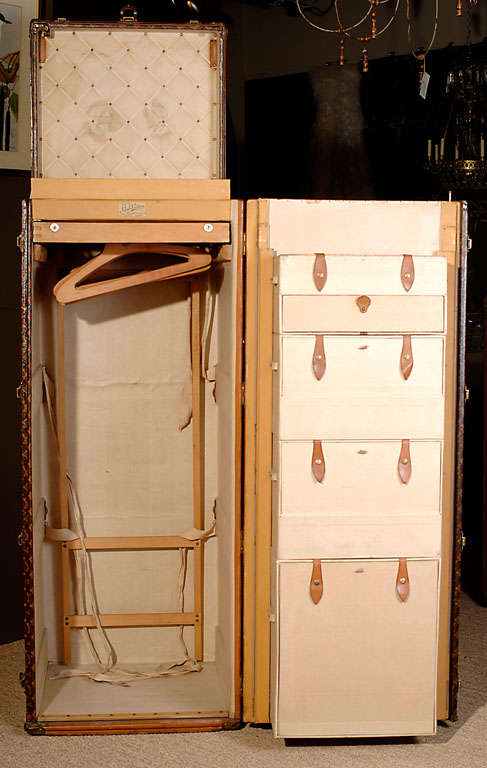 Features original manufacturer's label and serial number. Hardware, hangers and leather pulls all feature Louis Vuitton marks.

View our complete collection @ www.hollisandknight.com
