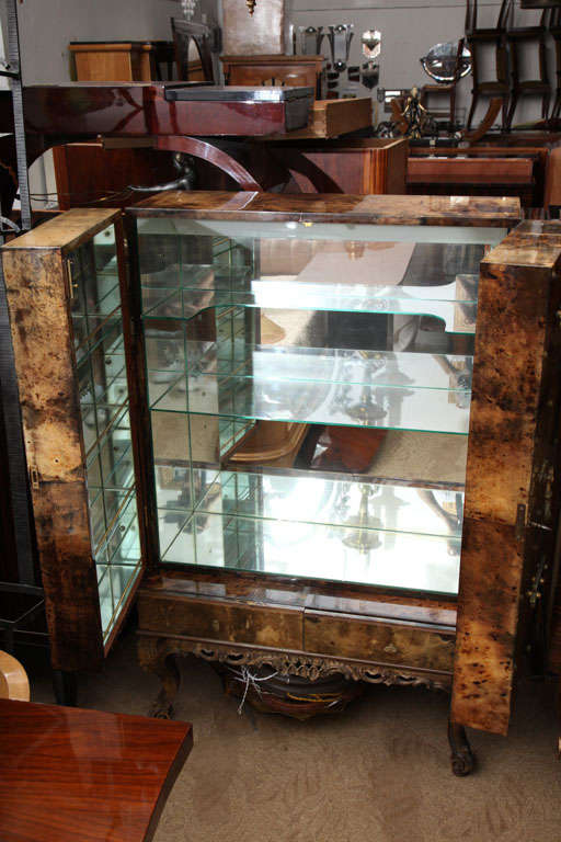 Parchment encased dry bar by Aldo Tura, Interior lined with Mirror. Interior Lights up when opened.