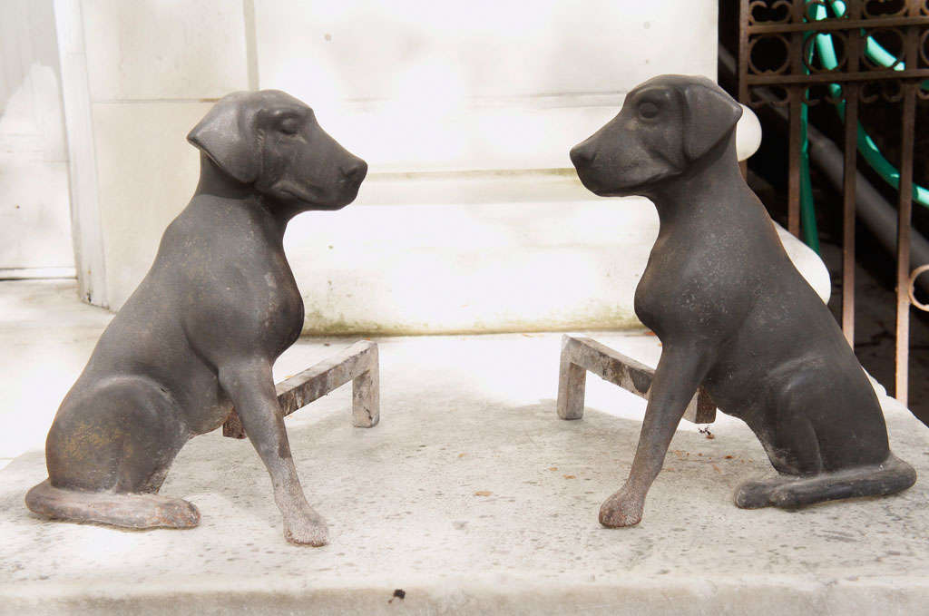 This pair of cast iron andirons are stamped Liberty Foundry, St Louis ,Missouri. They have been a staple of the firm for almost a hundren years. This casting finer and more crisp than current production shows a truly sympathetic love of the animal.