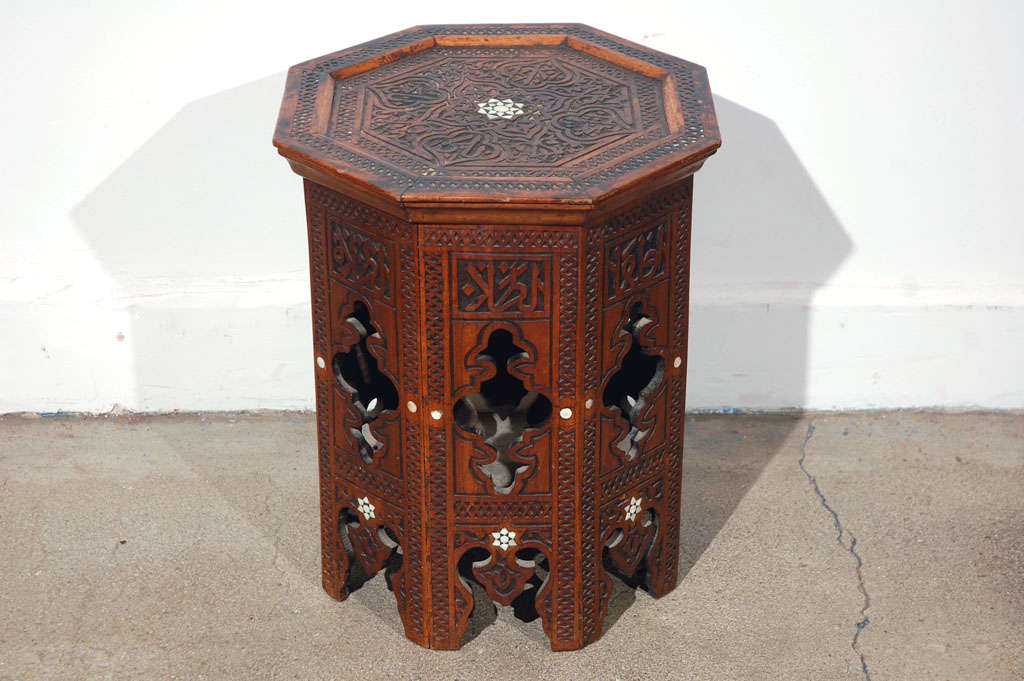 Antique Syrian octagonal side tea table, hand-graved and inlaid with mother of pearl.
Mosaik provides Antiques, Art Deco, Moorish Style, Spanish, African, Islamic Art, Arabian, Middle Eastern, Egyptian, Syrian Style, Indian, Indonesian,French,