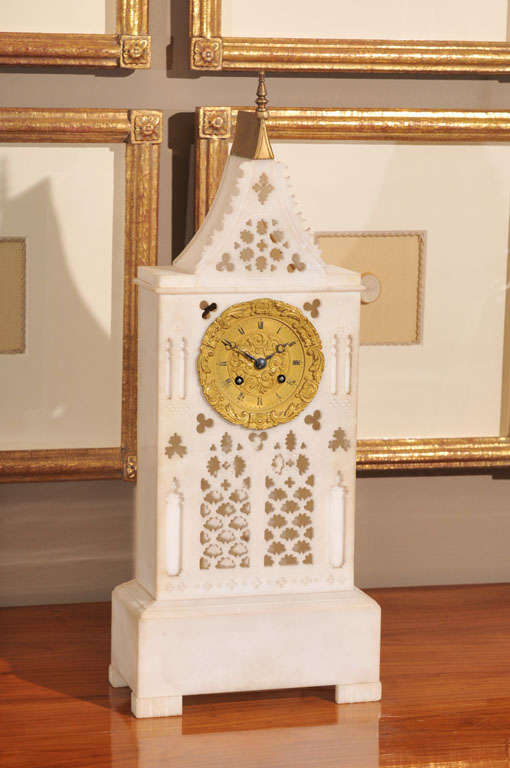 Early 19th Century Neoclassical French Marble Portico Mantle Clock with Gilt Bronze Ormolu of Griffin, Prosperity Maidens, and Eagles. The Porcelain Face with Blanc Fils Palais Royale (1807-1827). In Working Order.