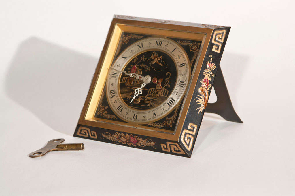 Offered here us a wonderful shelf clock with hand painted Chinoiserie decoration by Chelsea that dates around 1930.  Has key.
