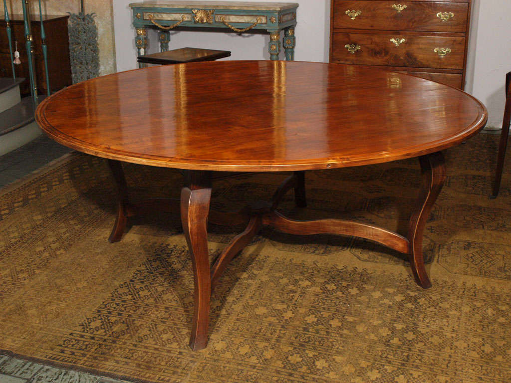 French provincial fruitwood round dining table at 1stDibs
