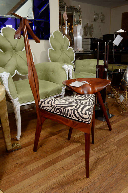 Wood Unusual stylized mahogany finish butler chair