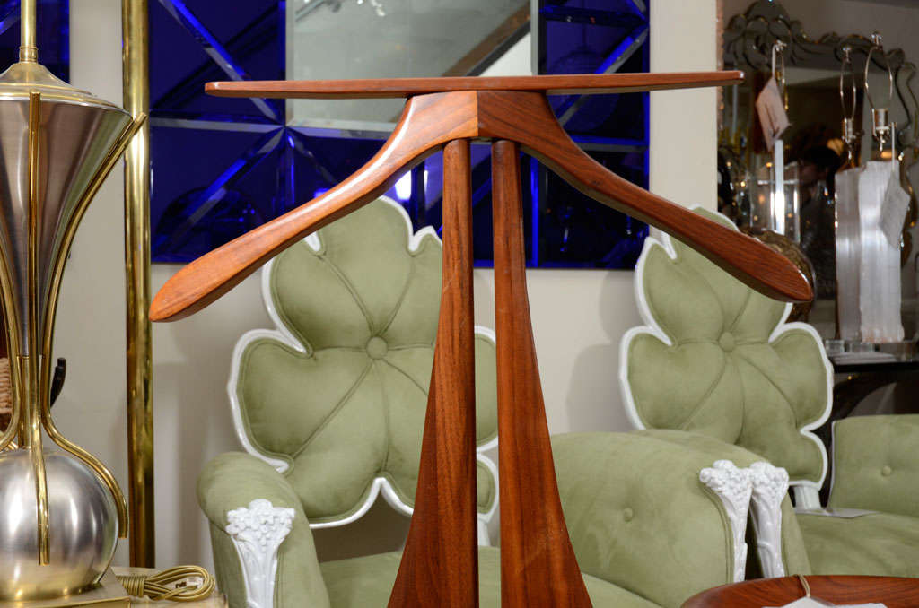 Stylized mahogany finish butler chair with faux zebra upholstery and flip top storage compartment beneath seat.<br />
<br />
View our complete collection at www.johnsalibello.com