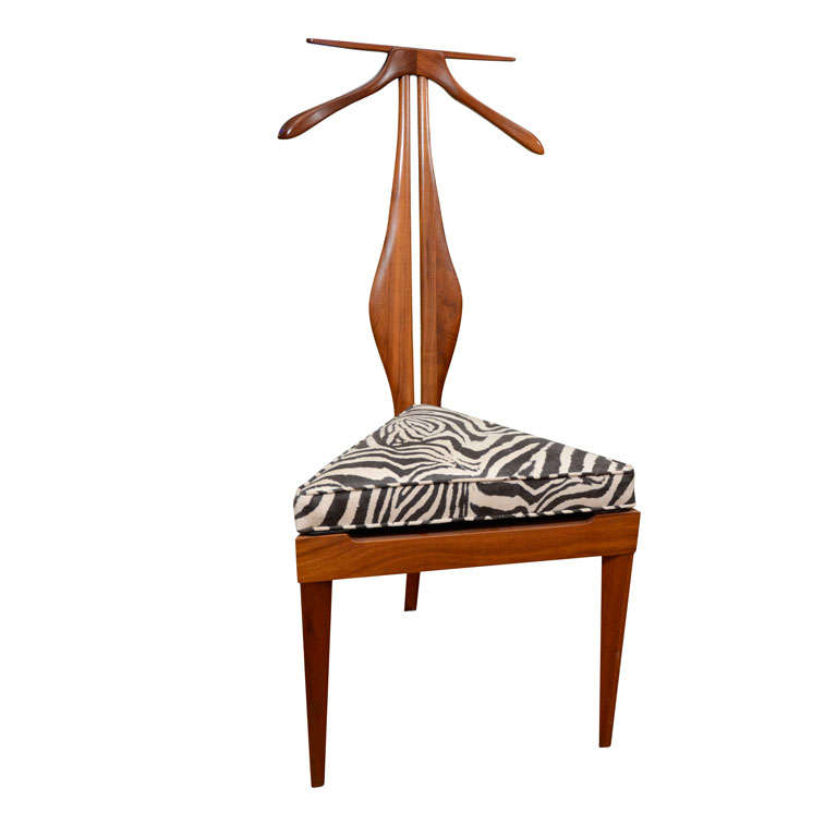 Unusual stylized mahogany finish butler chair