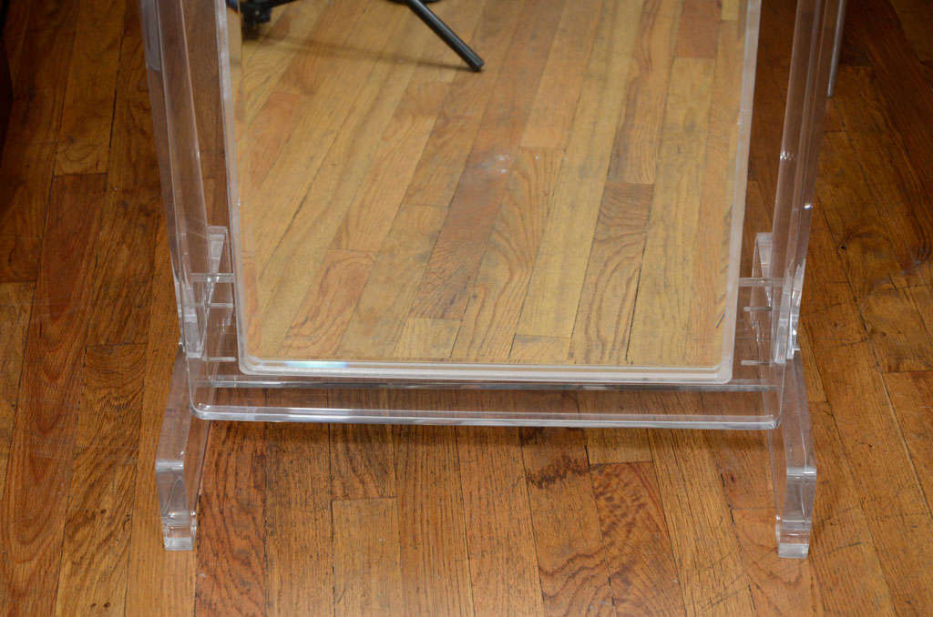 Mid-20th Century Lucite standing mirror with pivoting base