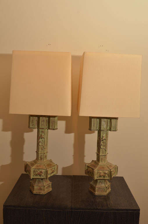 Exquisite pair of Lizard lamps by James Mont. The lamps are beautifully carved and have been siver leafed with a verdigris glaze, and are acccompanied by custom fabric shades and difusers.