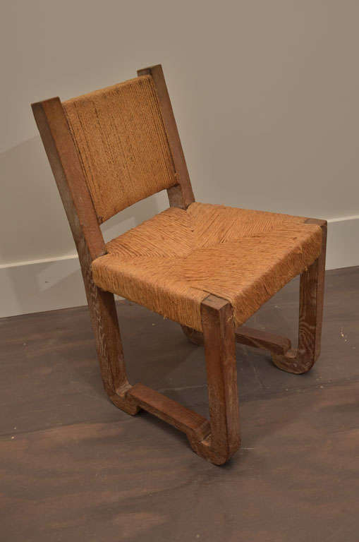 Interesting set of modernist style dining chairs. Rectangular Oak frame with woven seat and back. <br />
Seat Height: 17.5
