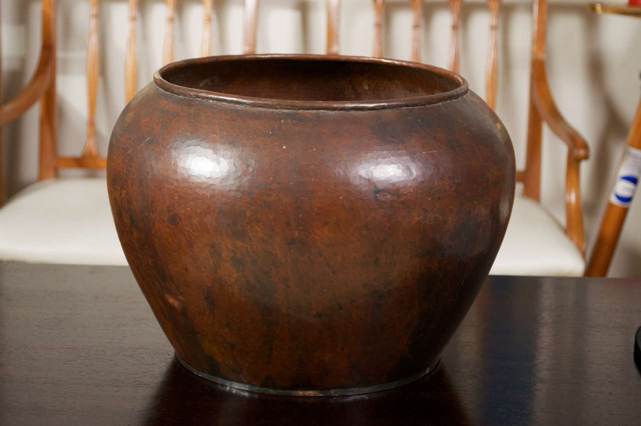 Exquisite example of Dirk Van Erp's work, a textured, hammered copper jardiniere with a nice rich patina. Piece has a rolled out rim, a pleasing mottled finish, and has the Windmill stamp on it's bottom. Saturday sale!.