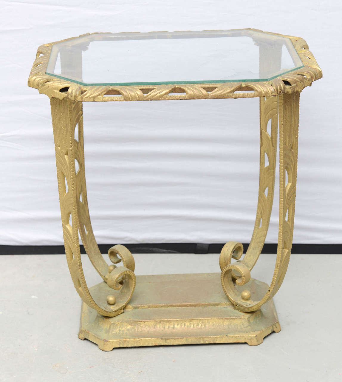 Beautiful heavy glass and metal Hollywood Regency side table from the USA 1930s.