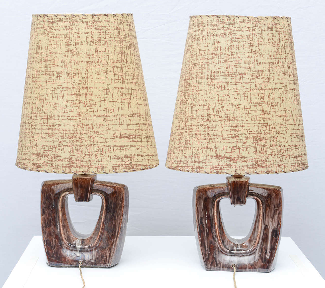 Beautiful pair of glazed ceramic Gonder Lamps from the USA 1950s with custom shades.