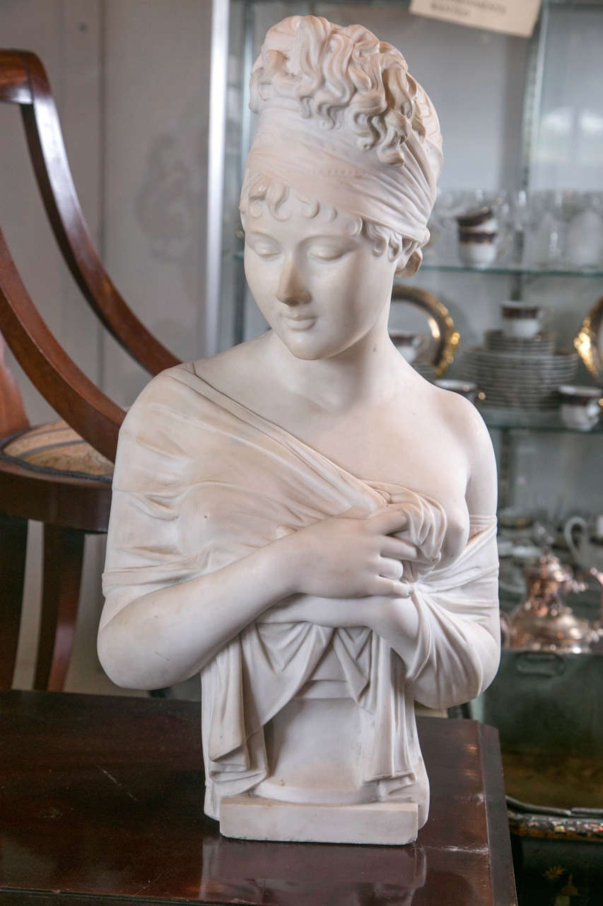 Mme. Recamier, a French socialite and patron of the arts was born in 1777. This bust is after the original by Joseph Chinard dating to circa 1801 (1755-1813). The original was in terra cotta and this copy, dating from the late 19th century, is