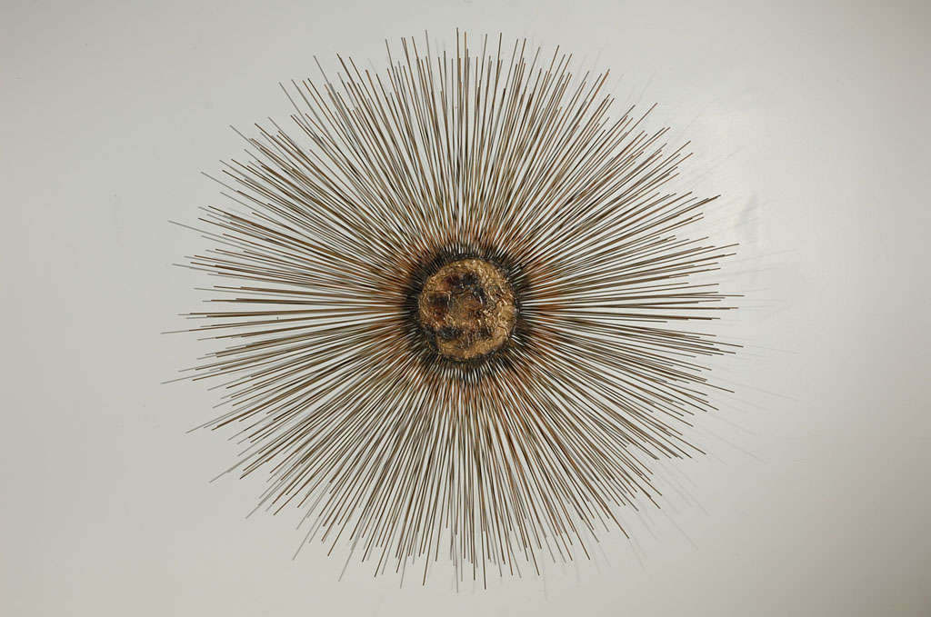 Brutalist style starburst wall sculpture.  Gilded center with bronze and gold tones.  Crafted by the NYC artist Bill Bowie who created fine works similar to C. Jere.