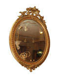 Oval gilt wood French mirror