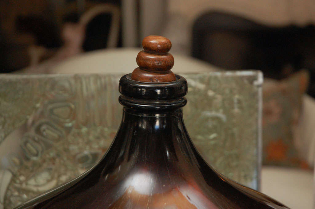 MAGNIFICENTLY SCALED MIRRORED BROWN GLASS BOTTLE - POSSIBLE USED TO STORE INK WITH TURNED WOODEN STOPPER.