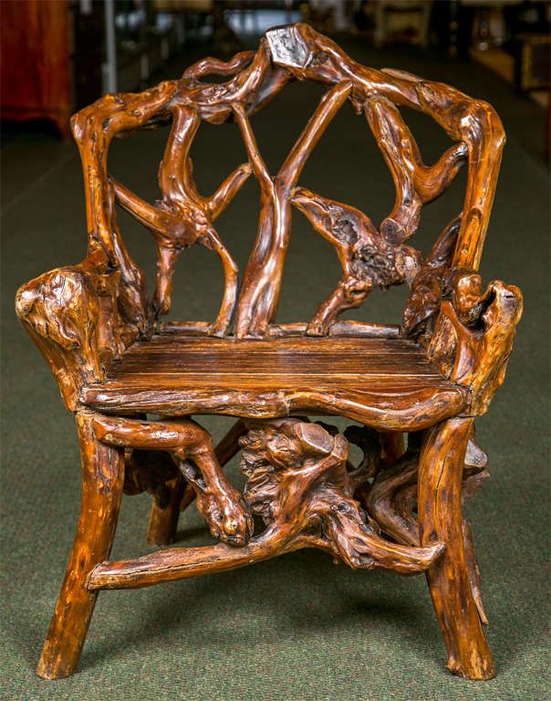 A diminutive Chinese root chair of great rustic charm.