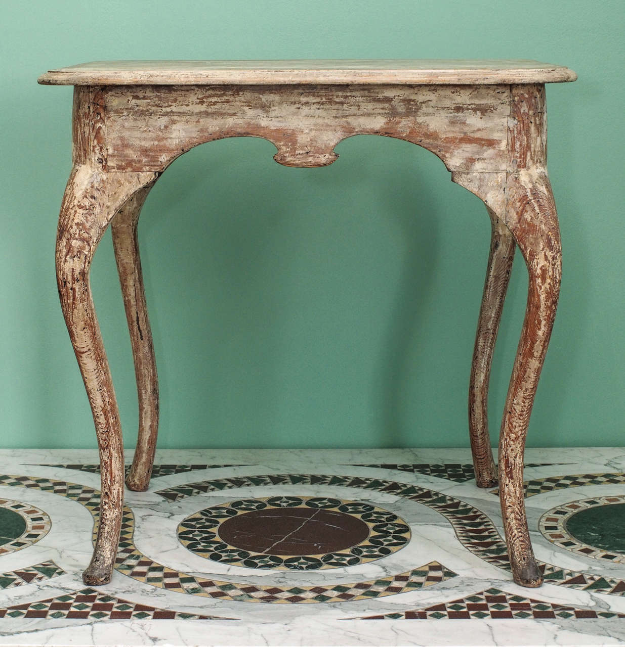 Very nice Swedish painted tea table with shaped skirt and cabriole legs.  Later paint removed.