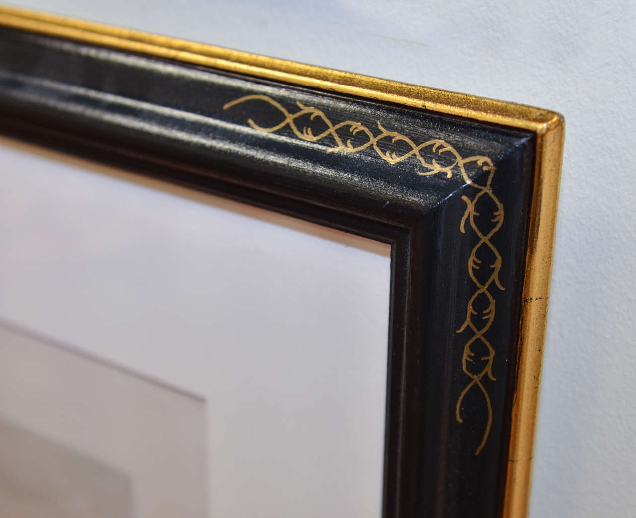 Four beautiful antique black and antique white Dutch landscapes.  The frames are custom painted ebony egg with gold details, accompanied with antique white matts.  The 18th century landscapes portray the Dutch countryside, sea, horses, cattle,