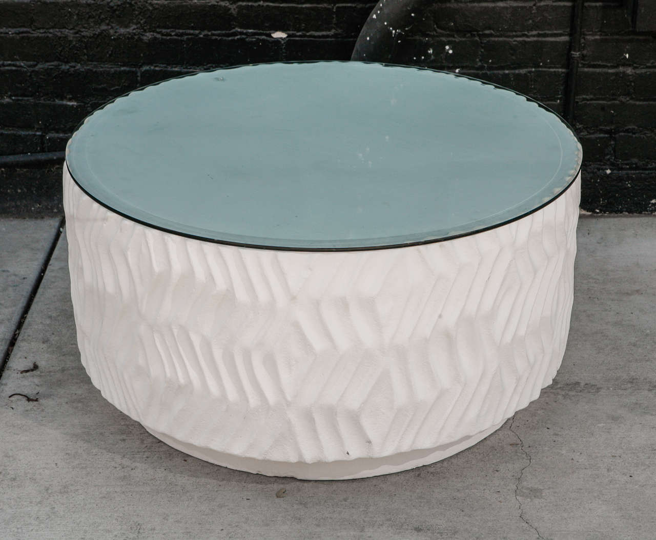Vintage 1970's White plaster round coffee table with glass top.